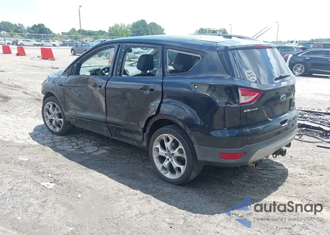 2013 Ford Escape Titanium z USA, uszkodzony, nr VIN 1FMCU0J90DUA13114